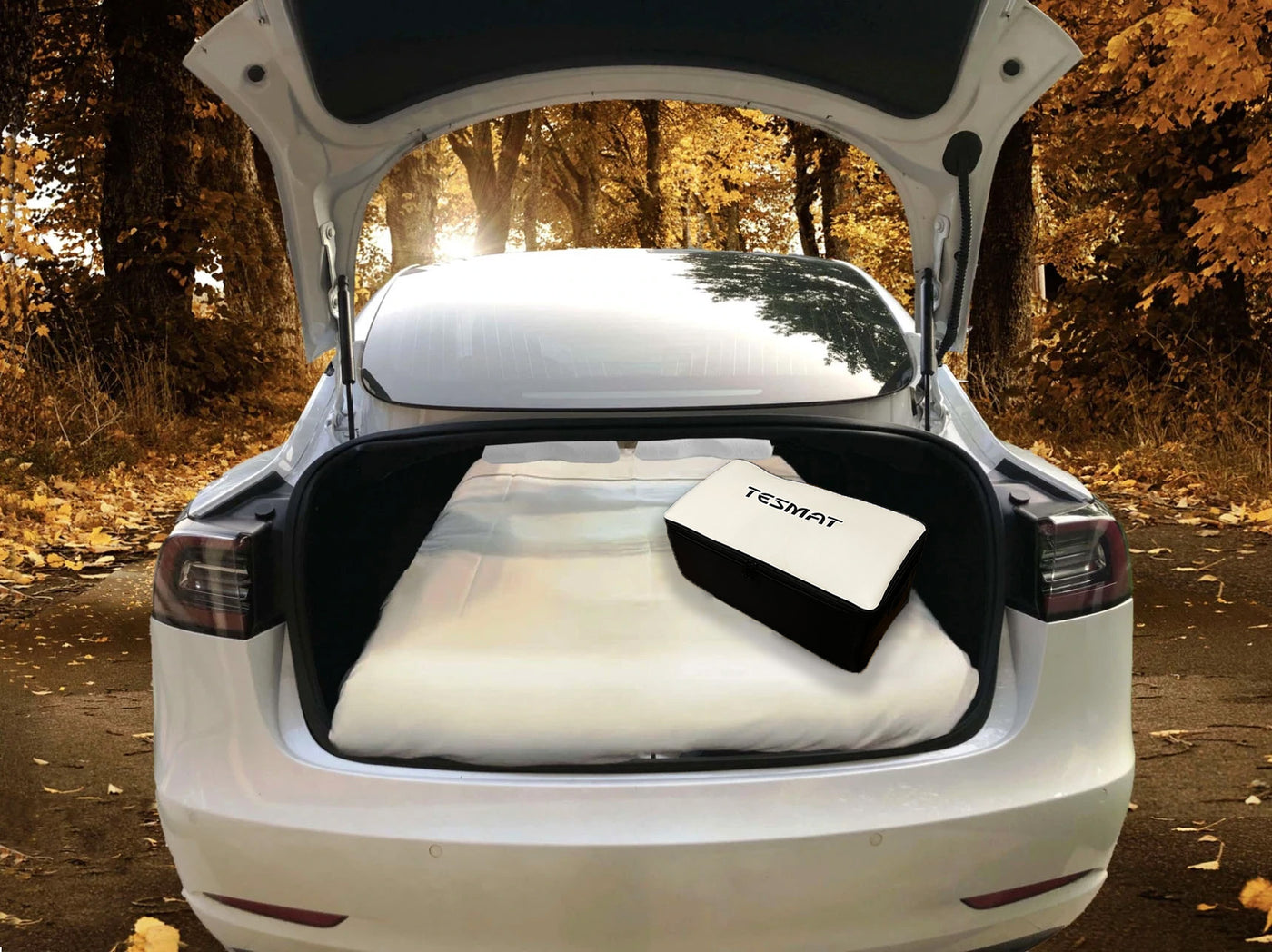 tesmat car camping mattress set up in tesla trunk